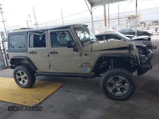 2018 Jeep Wrangler Unlimited Sport S with VIN 1C4BJWDG3JL809752, listed as a IAAI auction lot 42101293 with 50,342 mi miles and . Bid and sale history available at DreamBid. Image 13.