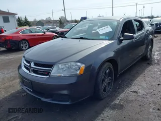 2014 Dodge Avenger SE with VIN 1C3CDZAG7EN218419, listed as a IAAI auction lot 41833778 with 133,192 mi miles. Bid and sale history available at carsss.com. Image 2.