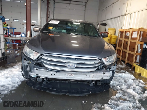 2013 Ford Taurus SEL z VIN 1FAHP2E89DG150197, wystawiony jako IAAI lot #41214999 z przebiegiem 146 307 mil mil oraz . Historia ofert i sprzedaży dostępna na DreamBid. Obrazek 13.