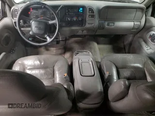 1999 GMC Suburban z VIN 3GKFK16R4XG540882, wystawiony jako Copart lot #80780884 z przebiegiem 209 819 mil mil oraz Czysty tytuł • Clean title. Historia ofert i sprzedaży dostępna na DreamBid. Obrazek 8.