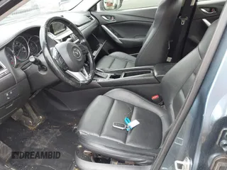 2016 Mazda Mazda6 i Touring with VIN JM1GJ1V56G1439360, listed as a IAAI auction lot 41987987 with 155,271 mi miles. Bid and sale history available at carsss.com. Image 5.