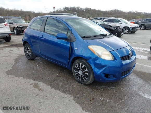 2009 Toyota Yaris with VIN JTDJT903695247842, listed as a IAAI auction lot 41836504 with 165,569 mi miles. Bid and sale history available at carsss.com. Image 1.