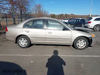 2002 Honda Civic LX with VIN 2HGES16642H552358, listed as a IAAI auction lot 40757858 with 138,320 mi miles. Bid and sale history available at carsss.com. Image 13.