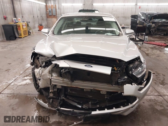 2016 Ford Fusion SE Hybrid z VIN 3FA6P0LU1GR304166, wystawiony jako IAAI lot #41932720 z przebiegiem 68 058 mil mil oraz . Historia ofert i sprzedaży dostępna na DreamBid. Obrazek 13.
