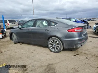 2020 Ford Fusion SE with VIN 3FA6P0T99LR261024, listed as a Copart auction lot 52929595 with 55,555 mi miles and Non repairable. Bid and sale history available at DreamBid. Image 2.