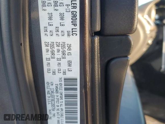 2014 Jeep Grand Cherokee Limited with VIN 1C4RJEBT8EC265764, listed as a Copart auction lot 47969994 with 110,502 mi miles and Salvage Title. Bid and sale history available at DreamBid. Image 12.