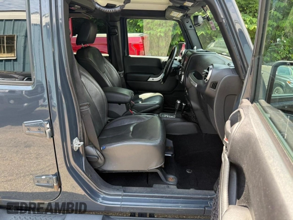 2016 Jeep Wrangler Unlimited Sahara with VIN 1C4BJWEG9GL169490, listed as a Copart auction lot 61507025 with 198,602 mi miles and Clean title. Bid and sale history available at DreamBid. Image 5.
