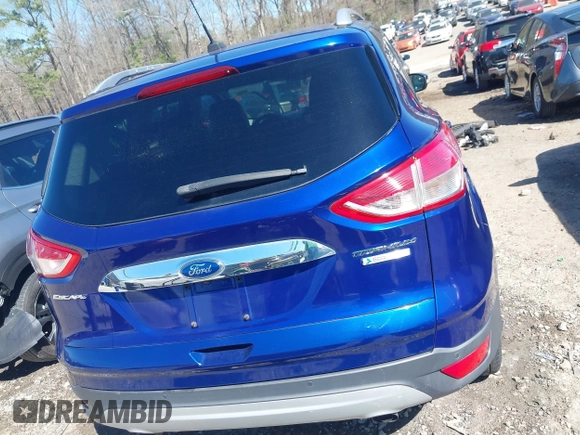 2015 Ford Escape Titanium with VIN 1FMCU0J93FUC20745, listed as a IAAI auction lot 41781551 with 174,538 mi miles and . Bid and sale history available at DreamBid. Image 17.