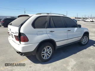 2006 BMW X5 3.0i with VIN 5UXFA135X6LY28695, listed as a Copart auction lot 77018914 with 209,013 mi miles and Salvage Title. Bid and sale history available at carsss.com. Image 3.