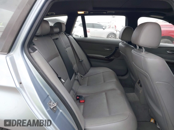 2012 BMW 3 Series 328i xDrive with VIN WBAUU3C5XCA543155, listed as a IAAI auction lot 42055373 with 192,198 mi miles and . Bid and sale history available at DreamBid. Image 8.
