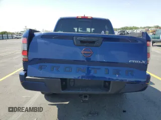 2022 Nissan Frontier Pro-X with VIN 1N6ED1EJ5NN610792, listed as a Copart auction lot 59897795 with 51,214 mi miles and Salvage title. Bid and sale history available at DreamBid. Image 6.
