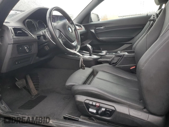 2020 BMW 2 Series 230i xDrive with VIN WBA2K1C08L7F94997, listed as a Copart auction lot 43188415 with 64,545 mi miles and Salvage Title. Bid and sale history available at carsss.com. Image 7.