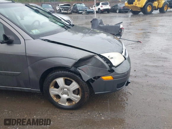 2007 Ford Focus S z VIN 1FAFP34N77W336075, wystawiony jako IAAI lot #42325783 z przebiegiem 153 194 mil mil oraz . Historia ofert i sprzedaży dostępna na DreamBid. Obrazek 6.