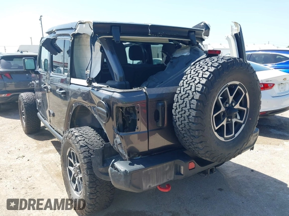2024 Jeep Wrangler Rubicon with VIN 1C4PJXFG5RW259926, listed as a IAAI auction lot 42009249 with 37,988 mi miles and . Bid and sale history available at DreamBid. Image 3.