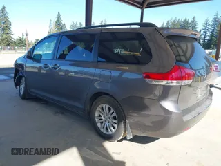 2011 Toyota Sienna XLE AAS with VIN 5TDYK3DC7BS047822, listed as a IAAI auction lot 42073635 with 150,424 mi miles. Bid and sale history available at carsss.com. Image 3.
