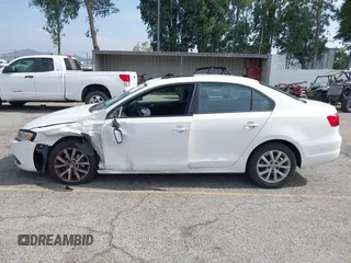 2012 Volkswagen Jetta SE z VIN 3VWDP7AJ3CM401411, wystawiony jako IAAI lot #42374516 z przebiegiem 222 317 mil mil oraz . Historia ofert i sprzedaży dostępna na DreamBid. Obrazek 14.