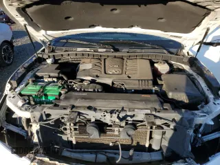 2012 Infiniti QX56 7-passenger with VIN JN8AZ2NE1C9021857, listed as a Copart auction lot 76967164 with 153,958 mi miles and Salvage Title. Bid and sale history available at carsss.com. Image 12.