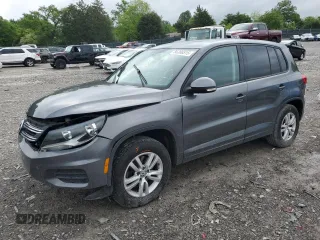 2013 Volkswagen Tiguan S z VIN WVGAV3AX6DW597379, wystawiony jako Copart lot #56386515 z przebiegiem 100 415 mil mil oraz Czysty tytuł • Clean title. Historia ofert i sprzedaży dostępna na DreamBid. Obrazek 1.