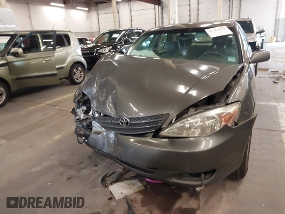 2003 Toyota Camry LE with VIN 4T1BE32K13U754348, listed as a IAAI auction lot 41765418 with 194,227 mi miles and . Bid and sale history available at DreamBid. Image 13.