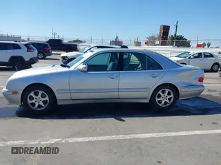 2002 Mercedes-Benz E-Class with VIN WDBJF65J82B447785, listed as a IAAI auction lot 41997147 with 74,433 mi miles. Bid and sale history available at carsss.com. Image 14.