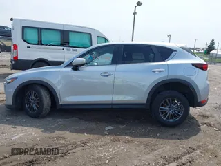 2020 Mazda CX-5 Touring with VIN JM3KFACM9L0785464, listed as a IAAI auction lot 42023311 with 90,062 mi miles and . Bid and sale history available at DreamBid. Image 14.