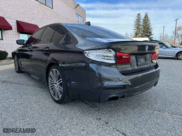 2018 BMW 5 Series M550i xDrive with VIN WBAJB9C53JB049688, listed as a Copart auction lot 48824465 with 127,200 mi miles and Clean Title. Bid and sale history available at carsss.com. Image 3.