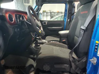 2023 Jeep Wrangler Rubicon z VIN 1C4HJXFN7PW693166, wystawiony jako Copart lot #84430324 z przebiegiem 40 093 mil mil oraz Szkoda całkowita • Salvage title. Historia ofert i sprzedaży dostępna na DreamBid. Obrazek 7.