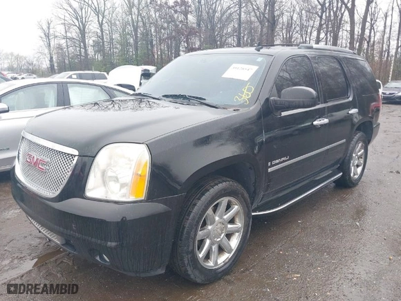 2009 GMC Yukon Denali with VIN 1GKFK03229R276923, listed as a IAAI auction lot 39128547 with 214,430 mi miles. Bid and sale history available at carsss.com. Image 2.