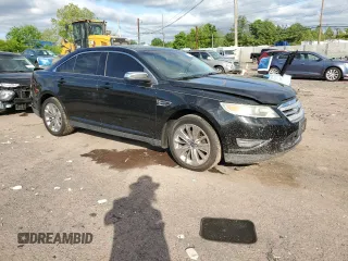 2012 Ford Taurus Limited z VIN 1FAHP2FW6CG136463, wystawiony jako Copart lot #57159005 z przebiegiem 124 833 mil mil oraz Szkoda całkowita • Salvage title. Historia ofert i sprzedaży dostępna na DreamBid. Obrazek 4.
