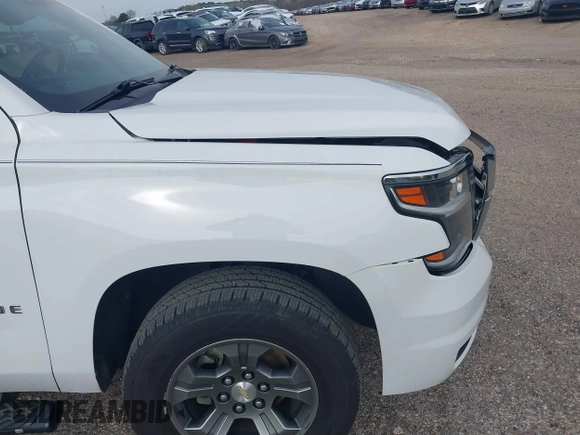 2017 Chevrolet Tahoe LT with VIN 1GNSKBKCXHR350028, listed as a IAAI auction lot 41684954 with 117,261 mi miles and . Bid and sale history available at DreamBid. Image 19.