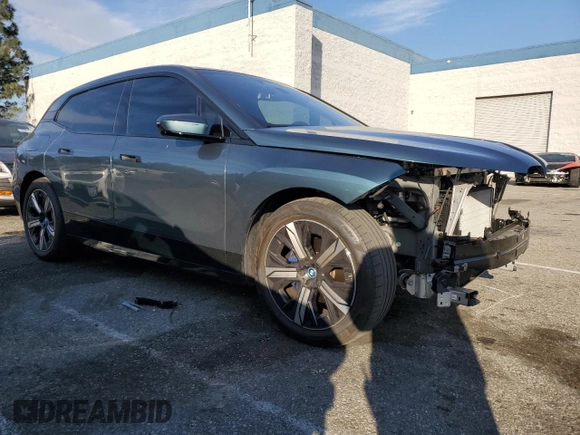 2023 BMW iX xDrive50 with VIN WB523CF03PCM54871, listed as a Copart auction lot 45988445 with 21,056 mi miles and Salvage Title. Bid and sale history available at carsss.com. Image 4.