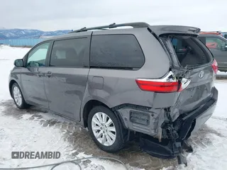 2016 Toyota Sienna LE with VIN 5TDJK3DC6GS142669, listed as a IAAI auction lot 41436771 with 135,715 mi miles. Bid and sale history available at carsss.com. Image 3.