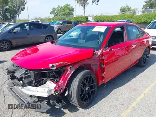 2023 Honda Civic Sport z VIN 2HGFE2F54PH559259, wystawiony jako IAAI lot #42201601 z przebiegiem 42 807 mil mil oraz . Historia ofert i sprzedaży dostępna na DreamBid. Obrazek 19.