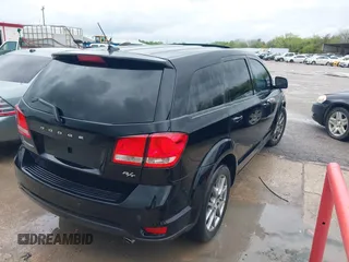 2014 Dodge Journey R/T z VIN 3C4PDCEGXET312377, wystawiony jako IAAI lot #41809991 z przebiegiem 228 789 mil mil oraz . Historia ofert i sprzedaży dostępna na DreamBid. Obrazek 4.