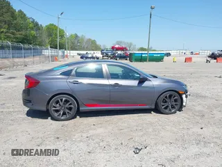 2019 Honda Civic Sport with VIN 2HGFC2F85KH576547, listed as a IAAI auction lot 42024497 with 86,468 mi miles and . Bid and sale history available at DreamBid. Image 13.