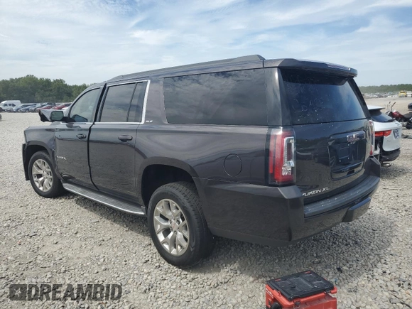 2015 GMC Yukon XL SLE z VIN 1GKS1GKC2FR625157, wystawiony jako Copart lot #69628124 z przebiegiem 153 022 mil mil oraz Szkoda całkowita • Salvage title. Historia ofert i sprzedaży dostępna na DreamBid. Obrazek 2.