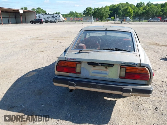 1983 Datsun 280ZX z VIN JN1HZ04S9DX573578, wystawiony jako IAAI lot #42516151 z przebiegiem 135 572 mil mil oraz . Historia ofert i sprzedaży dostępna na DreamBid. Obrazek 16.