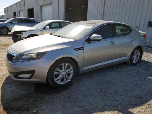 2013 Kia Optima EX with VIN 5XXGN4A75DG223402, listed as a Copart auction lot 52179355 with 157,742 mi miles and Salvage Title. Bid and sale history available at carsss.com. Image 1.