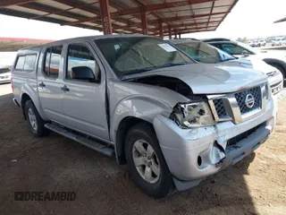 2012 Nissan Frontier SL with VIN 1N6AD0ER8CC473662, listed as a IAAI auction lot 41970410 with 186,498 mi miles and . Bid and sale history available at DreamBid. Image 1.
