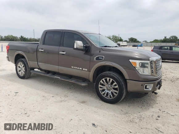 2016 Nissan Titan Platinum Reserve z VIN 1N6BA1F27GN507136, wystawiony jako Copart lot #53681615 z przebiegiem 155 101 mil mil oraz Czysty tytuł • Clean title. Historia ofert i sprzedaży dostępna na DreamBid. Obrazek 4.
