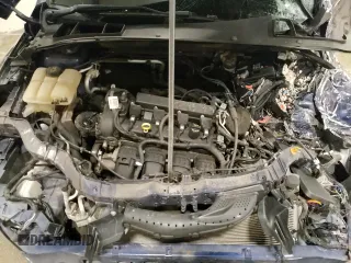 2016 Ford Focus Titanium z VIN 1FADP3J27GL310367, wystawiony jako Copart lot #55048005 z przebiegiem 86 676 mil mil oraz Szkoda całkowita • Salvage title. Historia ofert i sprzedaży dostępna na DreamBid. Obrazek 11.