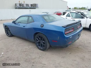 2023 Dodge Challenger GT with VIN 2C3CDZJG8PH582151, listed as a IAAI auction lot 41884343 with 34,259 mi miles. Bid and sale history available at carsss.com. Image 3.