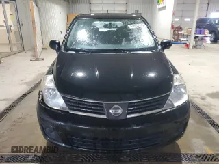 2007 Nissan Versa 1.8 S with VIN 3N1BC13E87L409263, listed as a Copart auction lot 53565105 with 124,860 mi miles and Salvage Title. Bid and sale history available at carsss.com. Image 5.