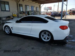 2014 BMW 4 Series 428i with VIN WBA3N3C57EF711803, listed as a Copart auction lot 57856695 with 68,905 mi miles and Salvage title. Bid and sale history available at DreamBid. Image 2.
