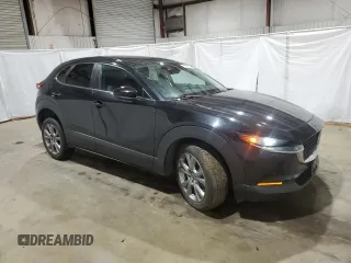 2021 Mazda CX-30 Select with VIN 3MVDMABL0MM246776, listed as a Copart auction lot 86130614 with 81,446 mi miles and Clean title. Bid and sale history available at DreamBid. Image 4.