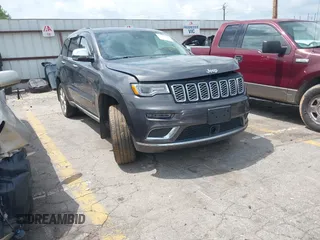 2020 Jeep Grand Cherokee Summit with VIN 1C4RJFJT0LC137054, listed as a IAAI auction lot 42235704 with 70,000 mi miles and . Bid and sale history available at DreamBid. Image 1.