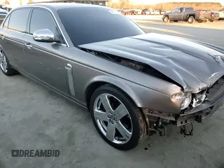 2008 Jaguar XJ Vanden Plas with VIN SAJWA82B18SH28807, listed as a Copart auction lot 42571155 with 97,548 mi miles and Salvage Title. Bid and sale history available at carsss.com. Image 10.