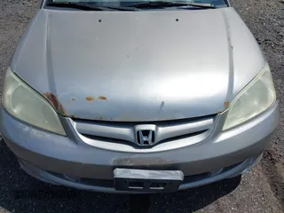2004 Honda Civic LX with VIN 2HGES16544H551186, listed as a IAAI auction lot 42202191 with 161,254 mi miles and . Bid and sale history available at DreamBid. Image 12.