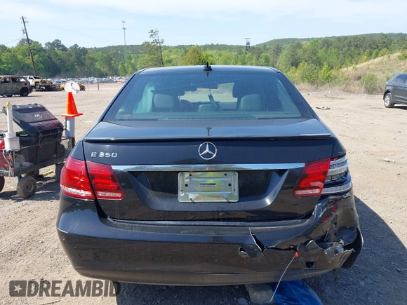 2015 Mercedes-Benz E 350 Sport with VIN WDDHF5KB5FB089242, listed as a IAAI auction lot 41823554 with 154,153 mi miles and . Bid and sale history available at DreamBid. Image 16.