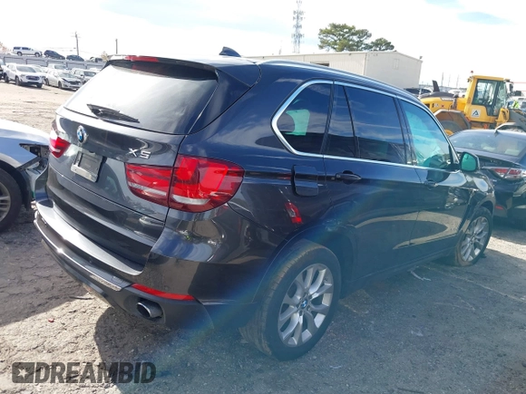 2014 BMW X5 sDrive35i with VIN 5UXKR2C56E0H32059, listed as a IAAI auction lot 41096908 with 124,322 mi miles. Bid and sale history available at carsss.com. Image 4.